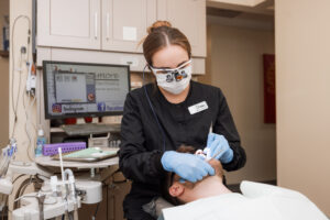 dentist cleaning teeth