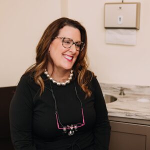 Dr. Larrimore smiling during a patient consultation at Larrimore Family Dentistry