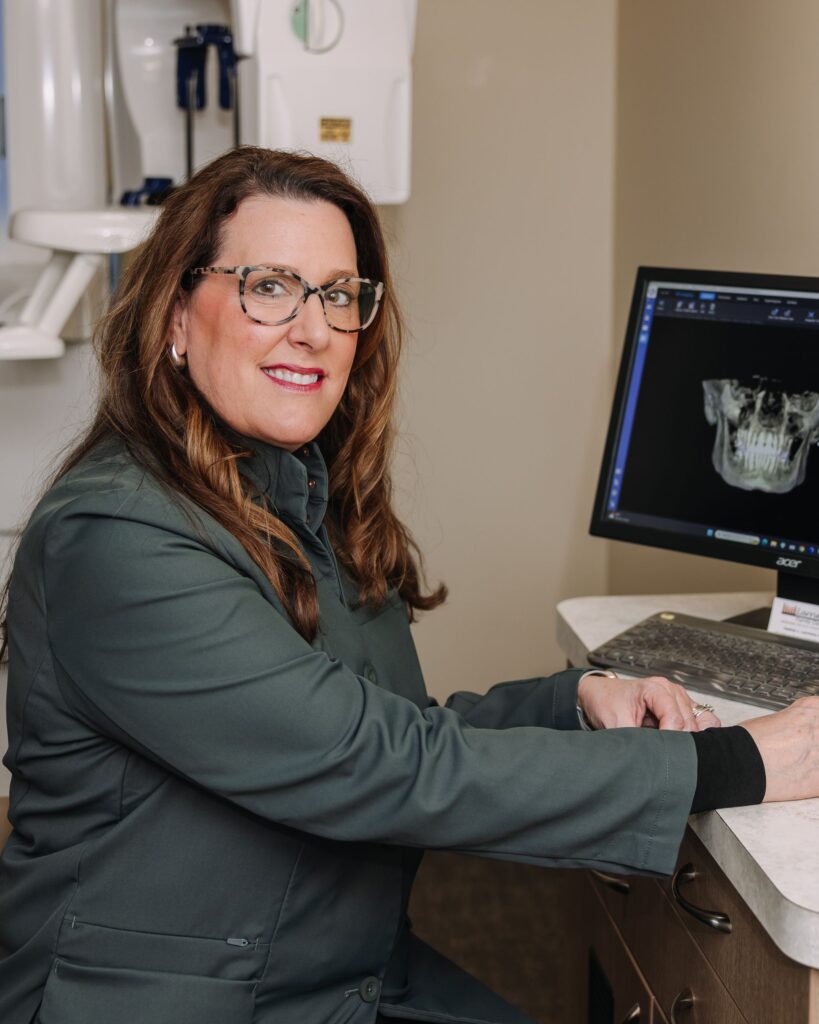 Dentist consulting with patient about oral health and dental care during pregnancy