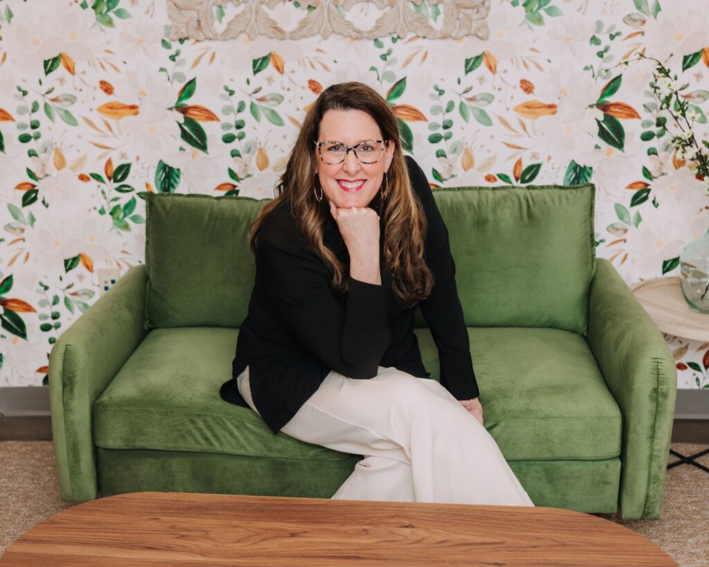 Dentist seated in office ready to welcome patients for dental care consultation