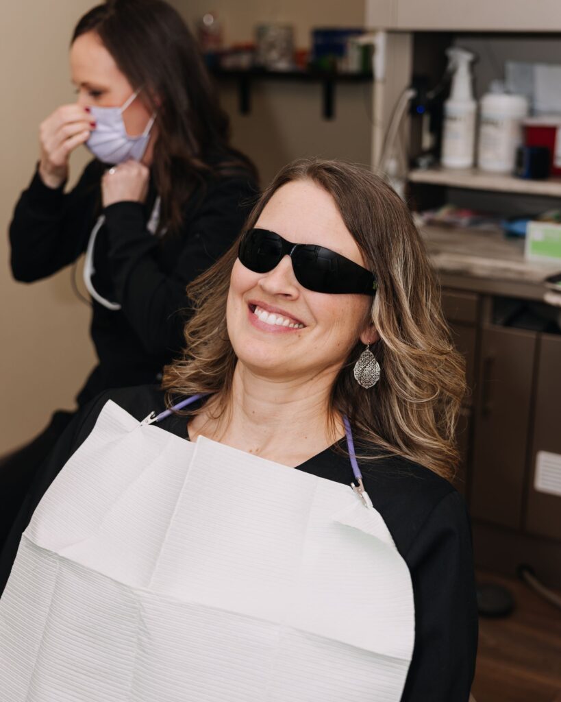 Relaxed patient smiling during a comfortable dental appointment
