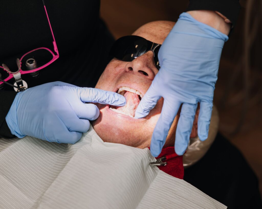 Close-up dental exam showing a patient’s mouth during an oral health evaluation