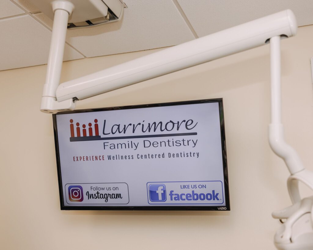 Larrimore Family Dentistry operatory screen displaying the wellness-centered dentistry message